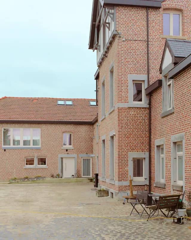 Façades rénovées de l'ancienne ferme à Pepinster